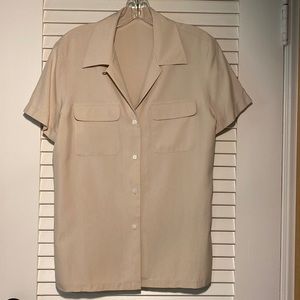 Boxy, soft camp type shirt, bust flap pockets, short sleeve, even hem side slits